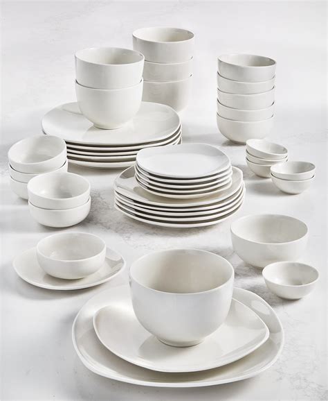 The Manoir collection from Villeroy & Boch offers a creamy white body with gentle scallpoed shape. . Macy dinnerware